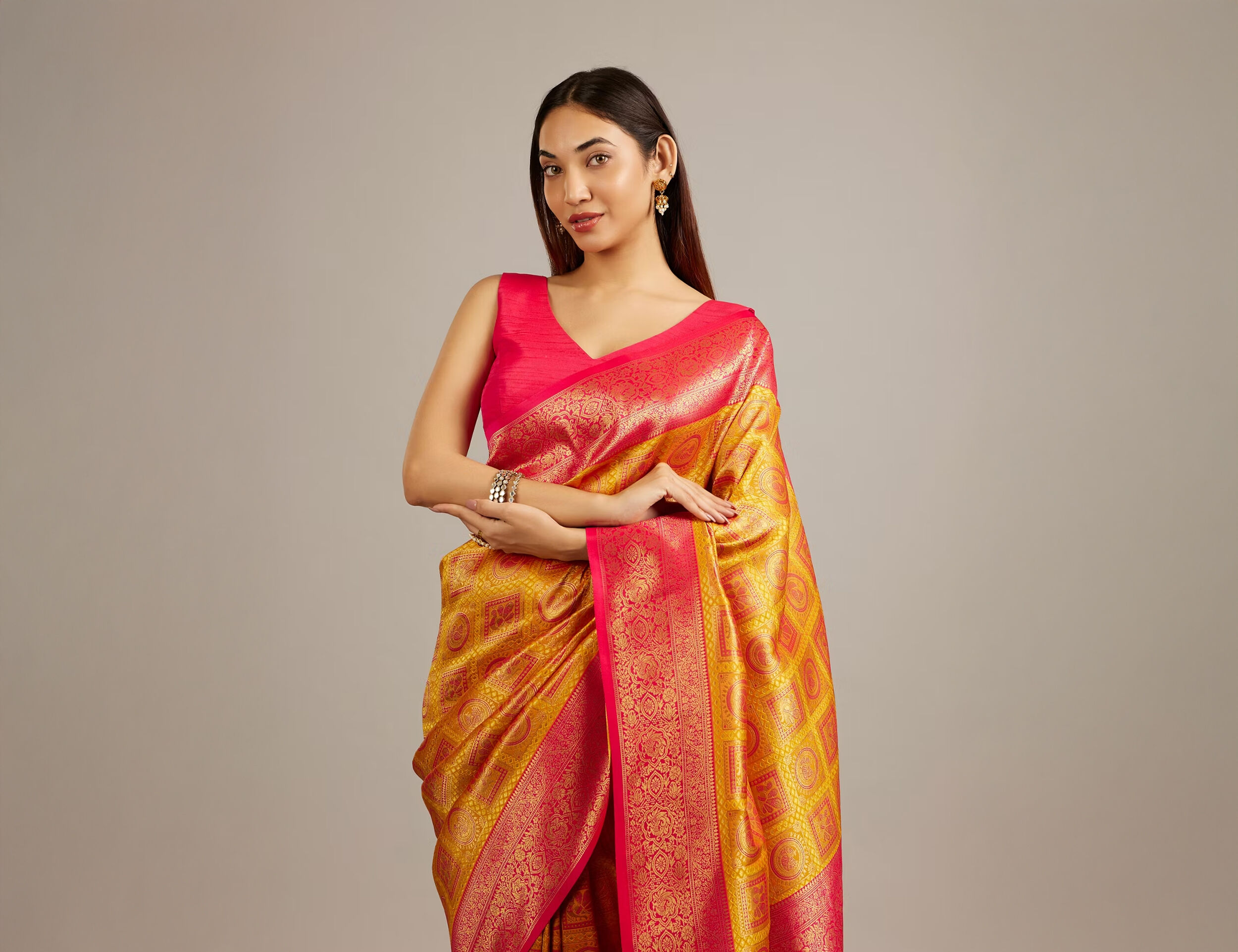 women wearing Yellow Art Silk Saree With Multicoloured Self Design